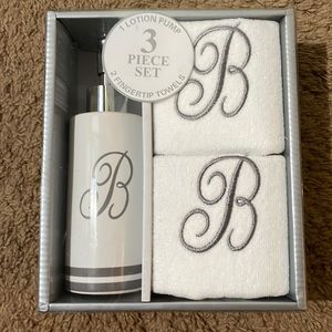 Two fingertip towels and soap/lotion pump for bathroom. Letter "B" embroidery
